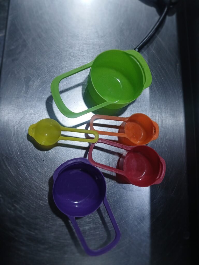 Measuring spoons showing 5 tablespoons and 1 teaspoon for 1/3 cup conversion.